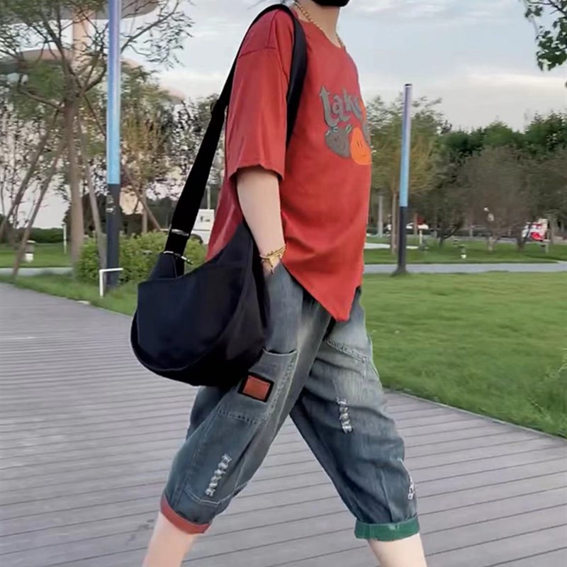 时尚两件套装女2024年夏季新款不规则印花T恤+薄款水洗牛仔六分裤