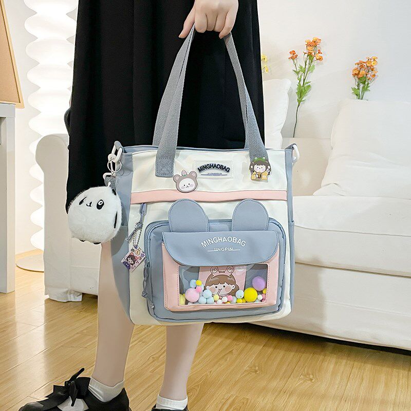 帆布包女斜挎单肩包小学生手提拎书袋百搭大容量学生上课包补习袋