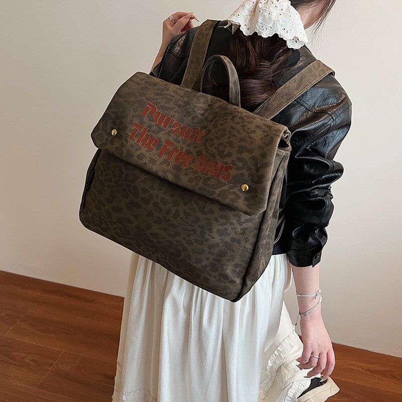 美式帆布双肩包包女2025新款潮时尚超火豹纹书包休闲大容量电脑包