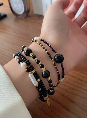 黑色天然石手链女2024年新款手工串珠高级感珍珠手饰叠戴情侣手串
