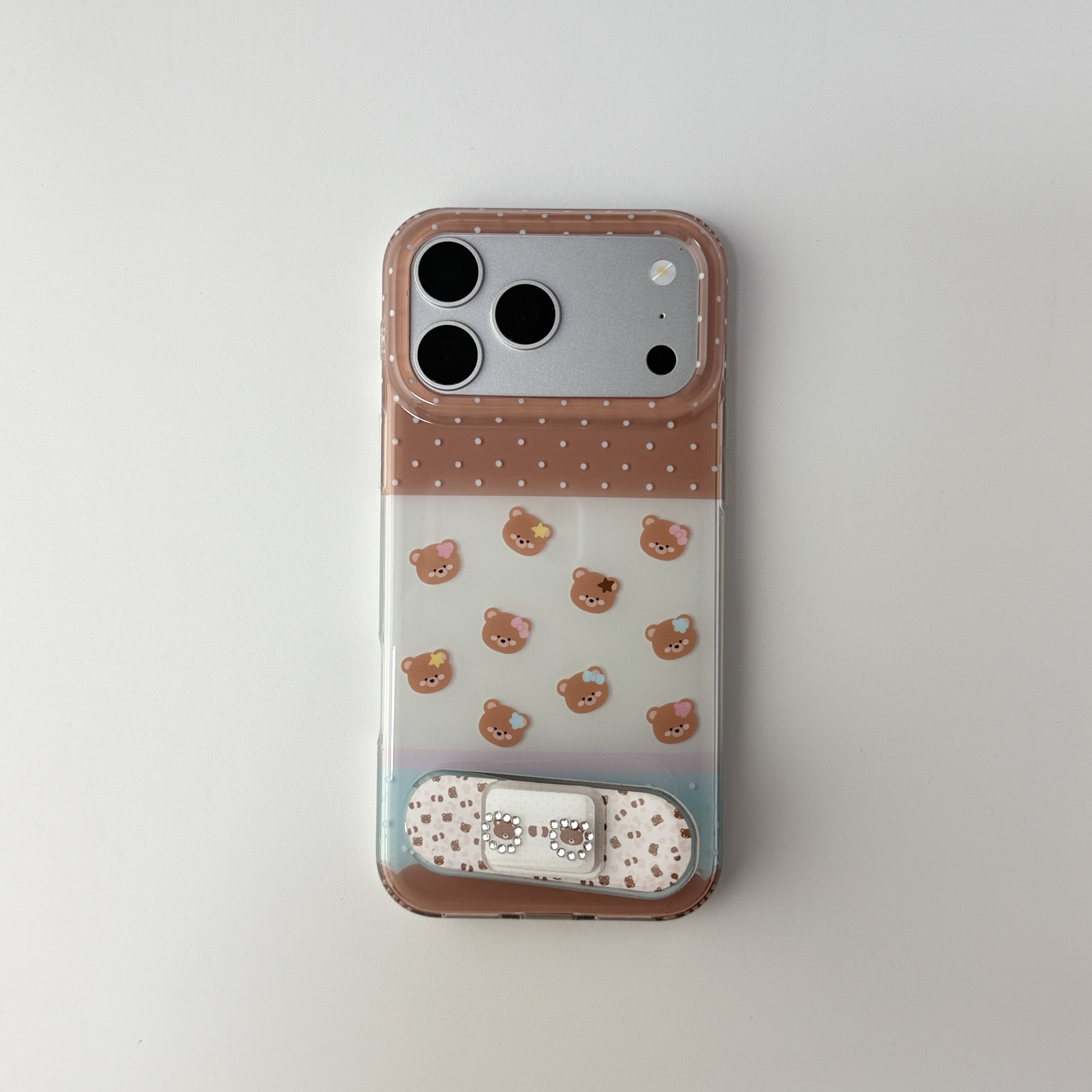 雨柠可爱波点小熊手机壳女款创可贴镶钻粘贴支架适用苹果iPhone18新款苹果17手机壳16卡通日韩15防摔保护套
