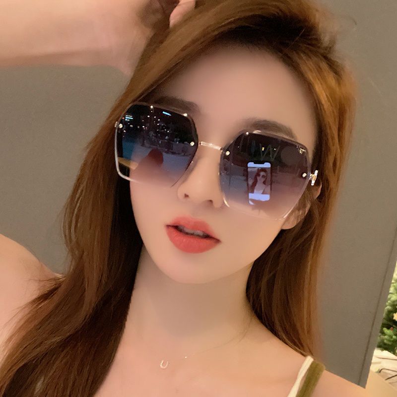 无边框太阳眼镜女2023新款正品遮阳防晒拍照显瘦墨镜圆脸高档眼镜