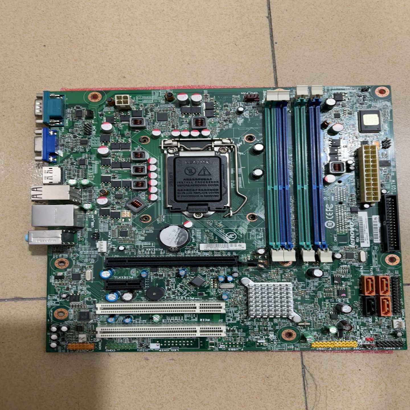 联想原装主板，型号IQ57M，适用于LGA1156平台。绿--议价商品