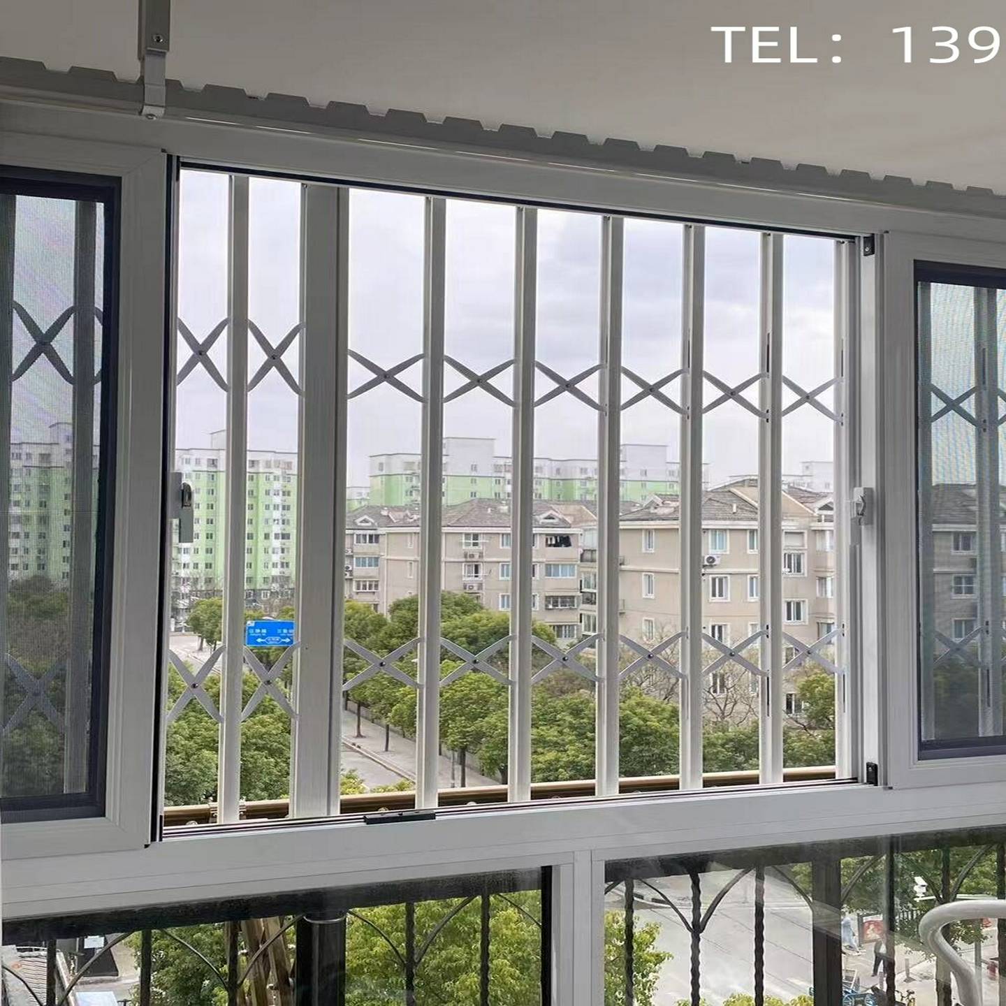 定做开启式推拉防盗窗升级款铝合金折叠拉闸门高层防护栏带锁
