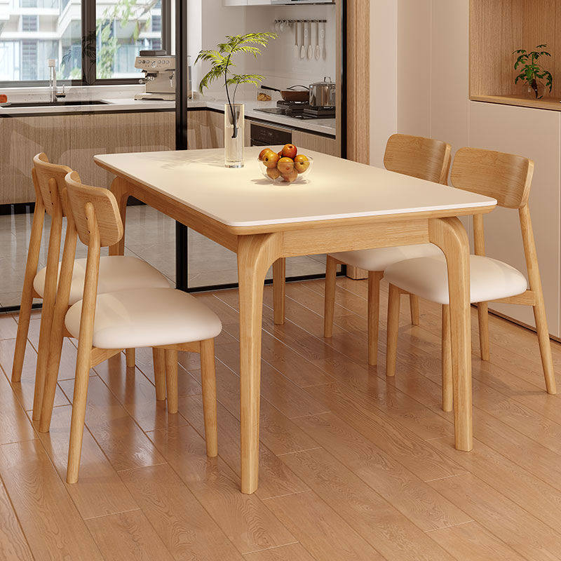 全实木岩板餐桌椅2024新款家用小户型吃饭桌现代简约长方形西