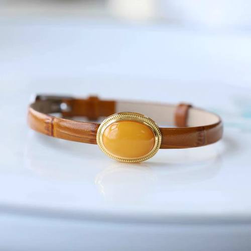 新款黄色椭圆蛋面棕色皮表带款手环鸡油黄色气质时尚百搭手链女