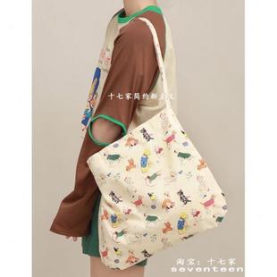 高档狗狗欢单肩斜卡通十七家帆布包腋下轻便大容量布袋乐通勤包可