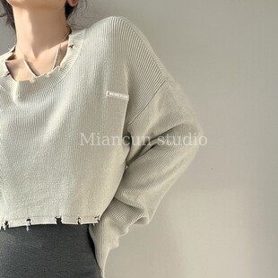 慵懒风别致破洞短款毛衣女秋季新设计感小众宽松外穿长袖