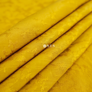姜黄色蝴蝶提花纯色复古麻布绣花布料汉服旗袍手工diy面料 布艺岛