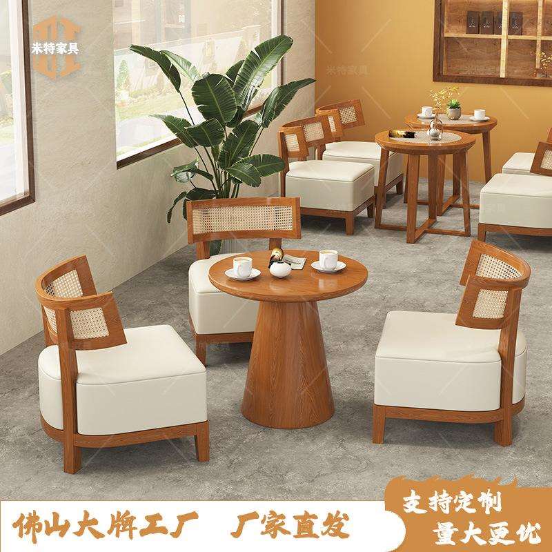 咖啡店洽谈桌椅组合设计师奶茶店编藤实木皮艺椅子甜品店休闲桌椅