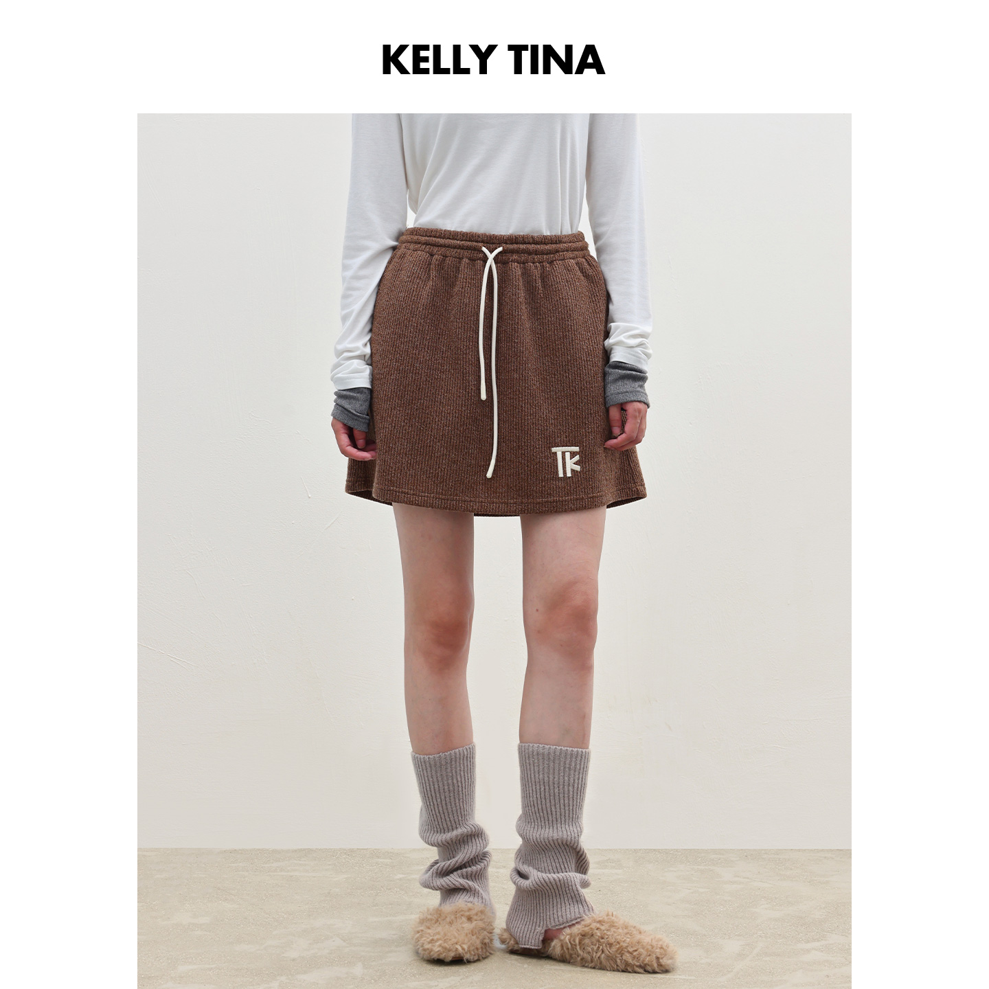 KELLY TINA 百搭大地色小A半身裙女2025新款法式复古休闲针织短裙