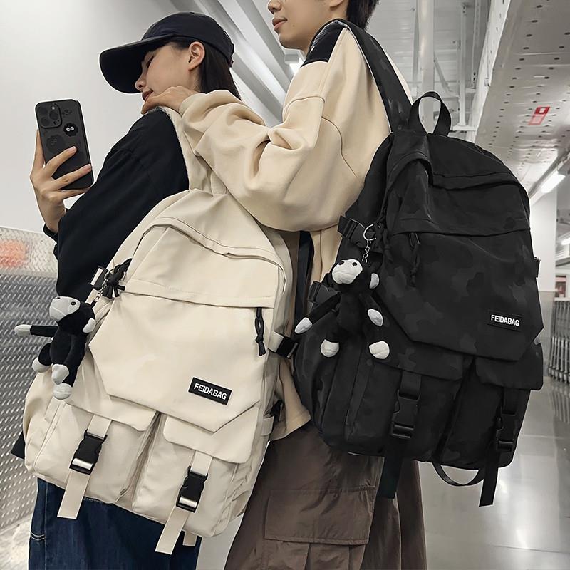 好货迷彩书包男初中生韩版高中女大容量双肩包女大学生中学生潮酷