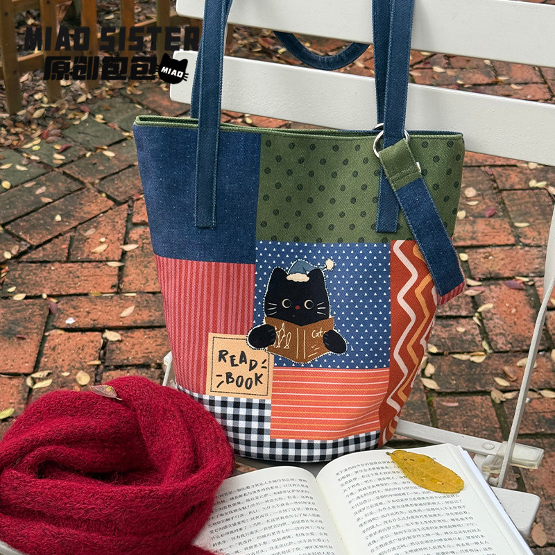 MIAO读书猫猫大容量水桶包女款单肩包女式2025新款斜挎包包夏通勤,箱包皮具/热销女包/男包,水桶包,淘宝优惠券,粉丝福利购,淘宝优惠卷