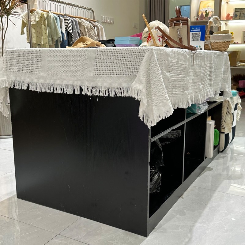 服装店中岛桌黑色双面格展示柜台女装店中间摆放陈列流水台展示桌