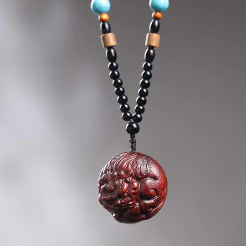 紫檀木貔貅手把件木雕貔貅把件紫檀貔貅抱球文玩手把件