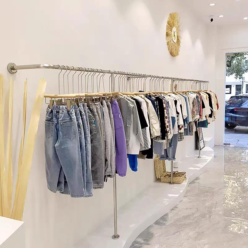服装店墙上挂衣架女装店不锈钢拉丝货架陈列壁挂架子服装架展示架