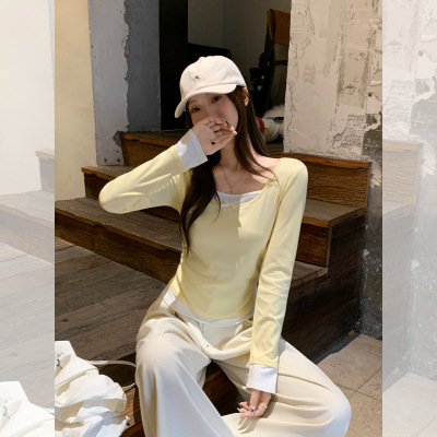 多巴胺鹅黄色拼接假两件蝴蝶结长袖T恤女秋季甜美修身设计感上衣