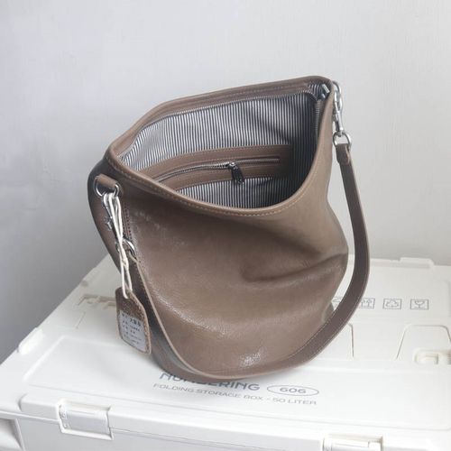 韩版真皮女包~休闲时q尚百搭气质单肩包斜挎包植糅头层牛皮水桶包