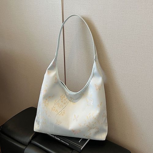 新中式国风单肩包2025新款刺绣简约百搭大容量U通勤单肩水桶包