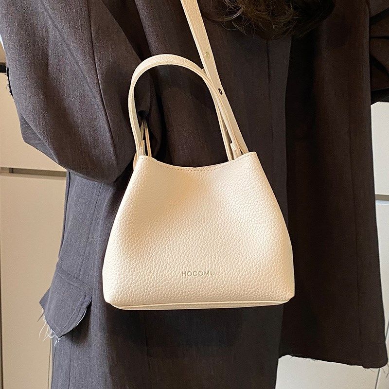 手提包小拎包2025新款水桶w包单肩斜挎女式外出休闲通勤小众迷你,箱包皮具/热销女包/男包,水桶包,淘宝优惠券,粉丝福利购,淘宝优惠卷