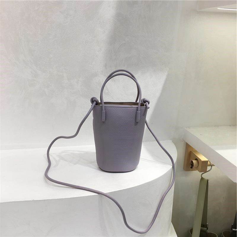 小脏柜 高级感精致荔枝纹百搭小手B提包2025新款单肩斜挎小水桶包