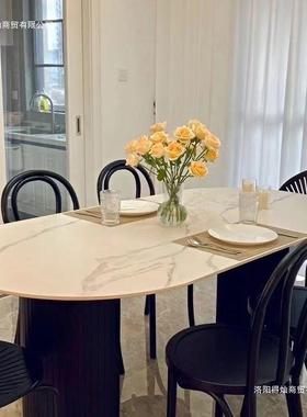 现代简约黑色椭圆形饭桌家用小户型餐厅轻奢网红款奶油风岩板餐桌