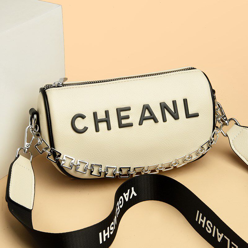 高级感字母软皮包包女2024新款宽肩带马鞍包牛皮休闲小型斜挎包