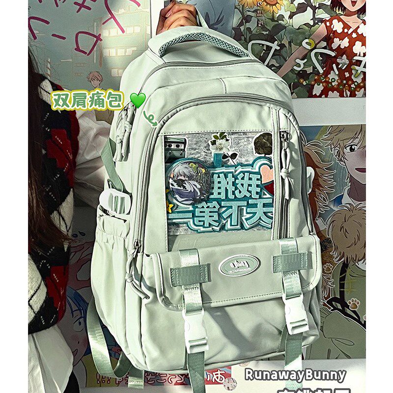绿色书包痛包初中女生高颜值二次元双肩包学生上学带痛层痛书包女