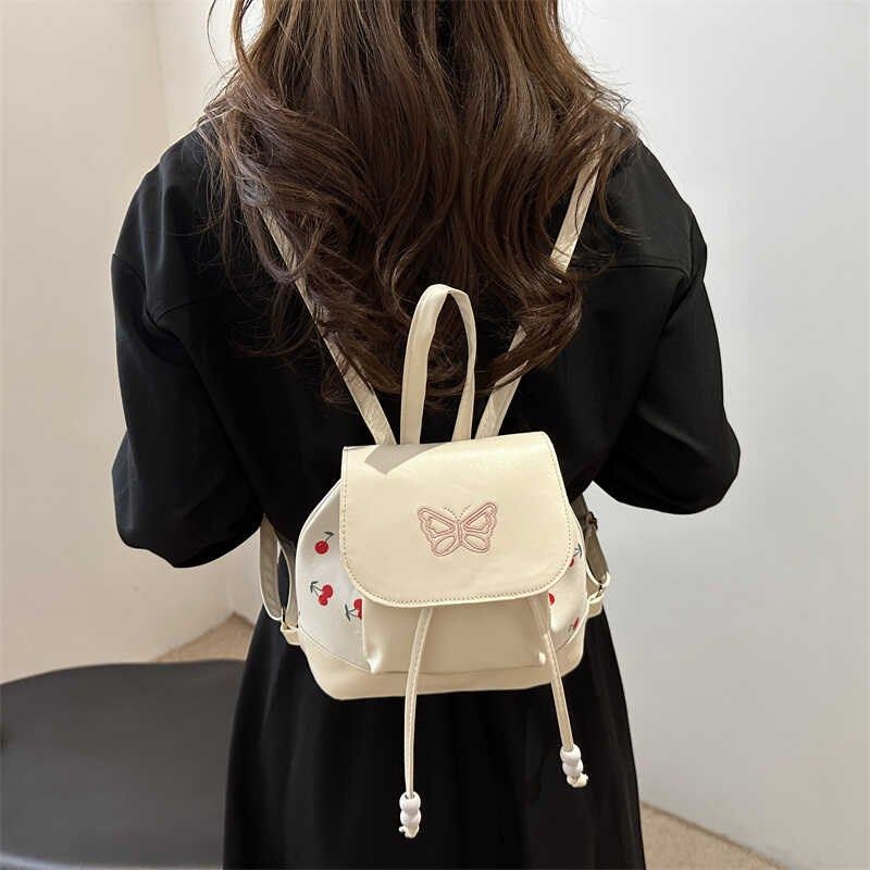 双肩包女生2024新款时尚设计感小众迷你小型轻便白色可爱逛街背包