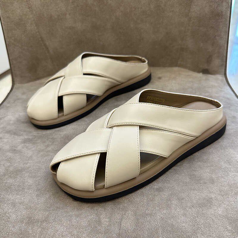 拖鞋女夏外穿高级感包头配裙子2025新款时尚真皮编织平底半拖凉鞋