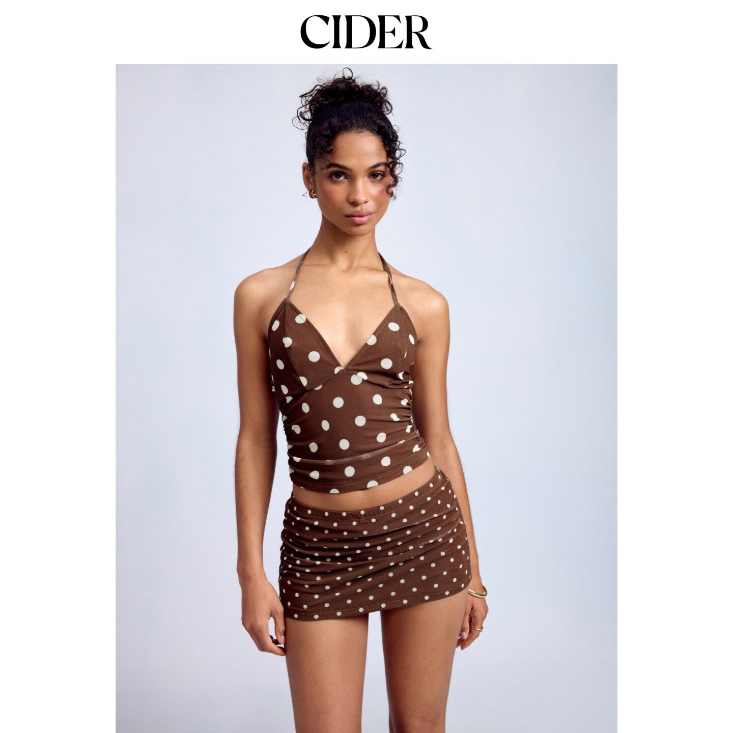 CIDER波点挂脖褶皱上衣搭配中腰迷你紧身半身裙套装115351013图片