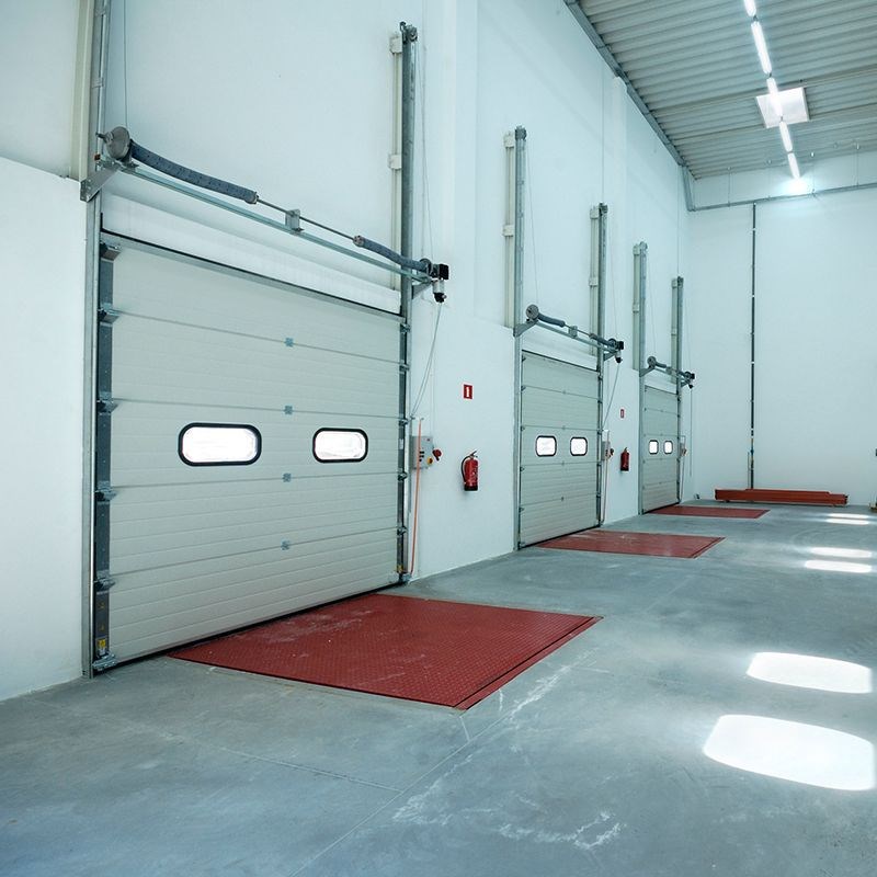仓库自动工业提升门 电动翻板车库门 透明小窗可视提升门供应