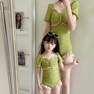 新款 儿童木耳边沙滩可爱泳 亲子泳衣g母女连体速干显白游泳衣短袖