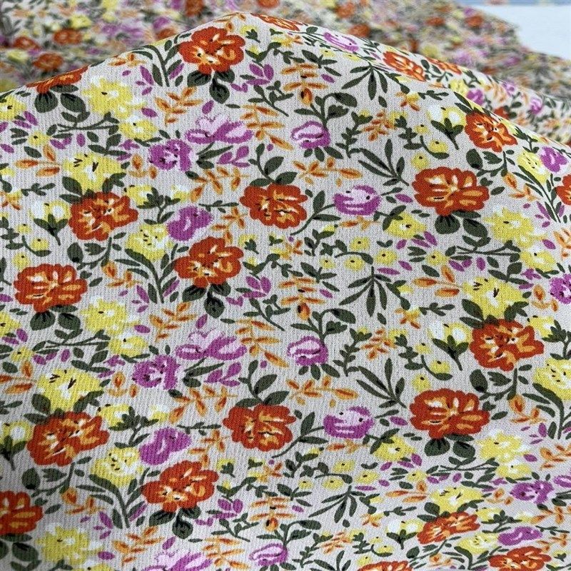 D412米色底小碎花印花雪纺布头 柔软透气垂坠连衣裙上衣旗袍面料