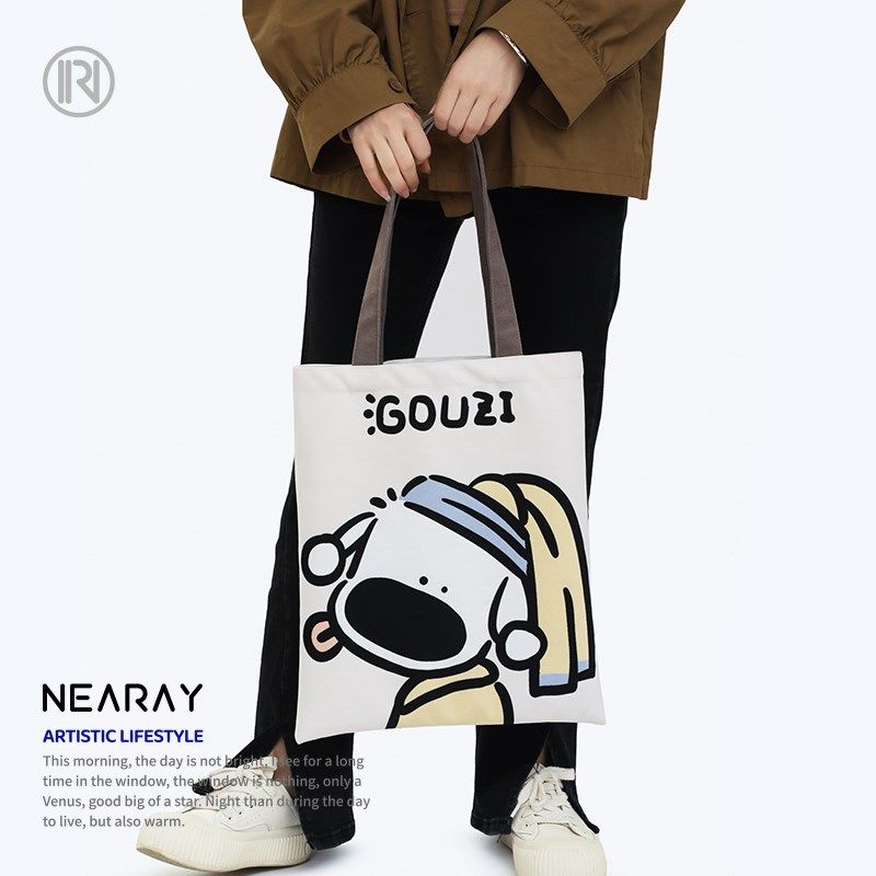 尼睿x吃盐的鱼 新款单肩包可爱狗子E学生书包简约印花手提帆布包,箱包皮具/热销女包/男包,通用款女包,淘宝优惠券,粉丝福利购,淘宝优惠卷