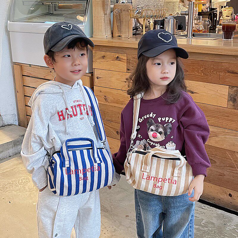 儿童包包b男孩休闲外出大容量手提包韩版帆布水桶包女童宝宝斜挎