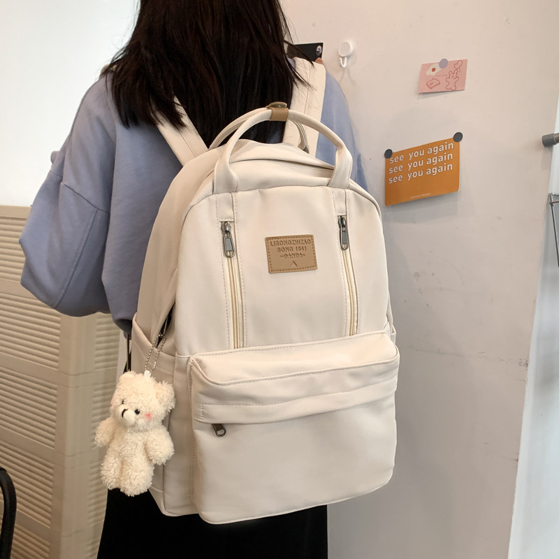 双肩包女2022新款背包简约旅游15.6寸电脑包大容量白色书包大学生