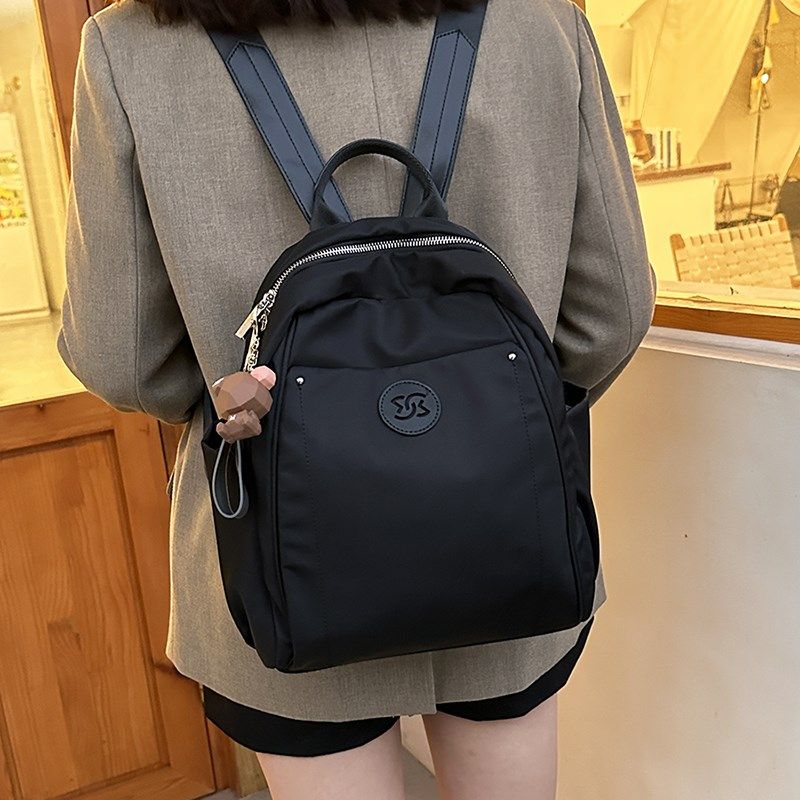 高级感防水女士通勤逛街双肩包20A24新款时尚小众风牛津布旅行背