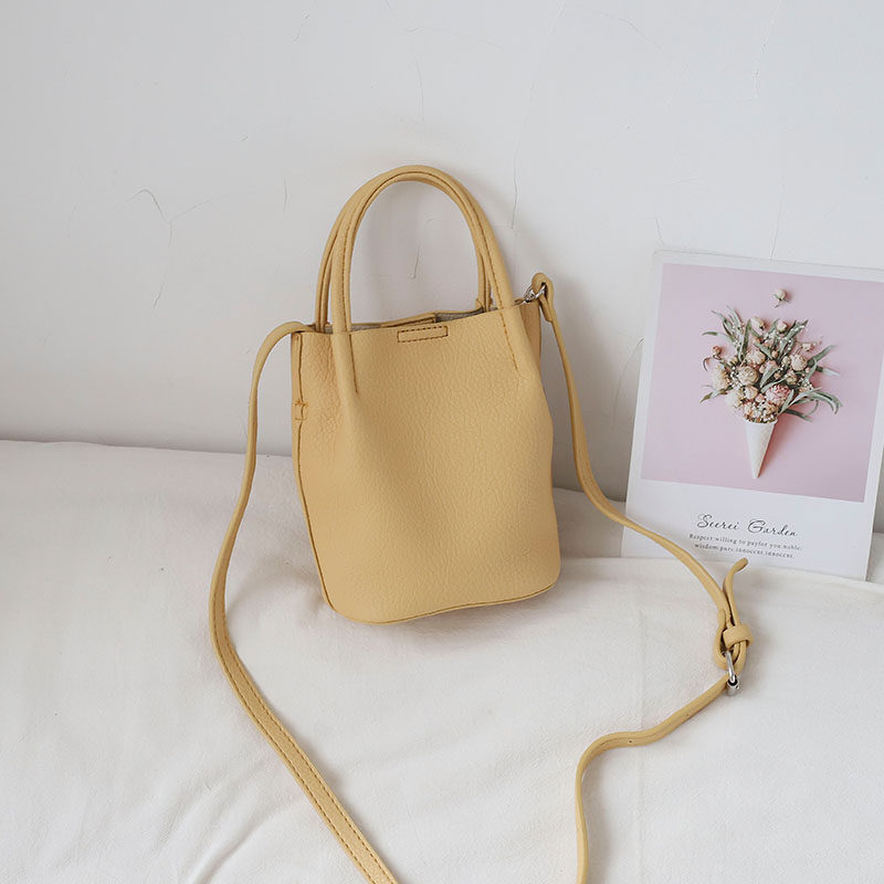 软面竖款小众小包包2022新款精致E夏季水桶包菜篮子女手提单肩斜,箱包皮具/热销女包/男包,水桶包,淘宝优惠券,粉丝福利购,淘宝优惠卷