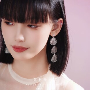 A银花翅膀耳环2025新款 仙气轻奢度假风独特女 爆款 高级感耳钉长款