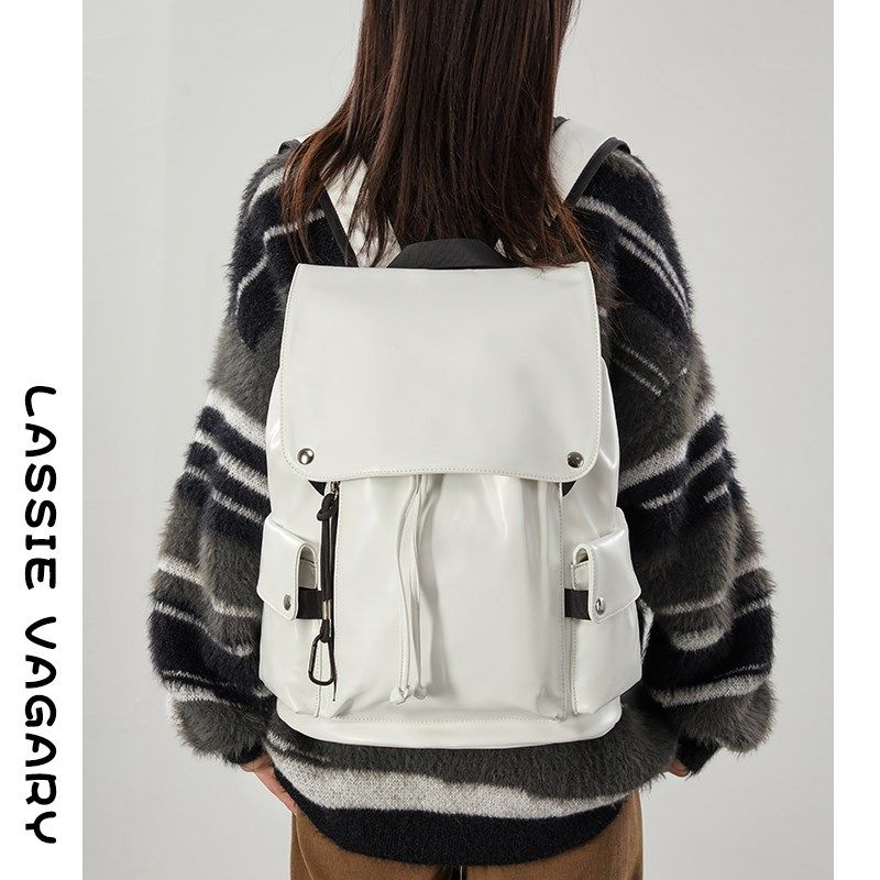 男女户外双肩包大容量旅行背包2024新款皮质通勤电脑包大学生书包