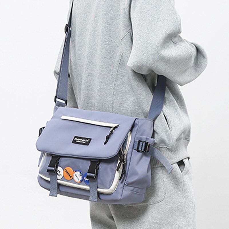痛包2025新款工装邮差包男大学生上课装书单肩揹包大容量斜挎包女