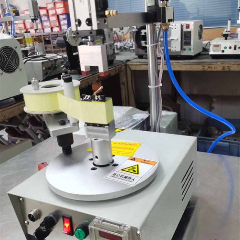 TM-10d00RS变压器外围胶带半自动包胶机带气缸压料食品盒子打包机