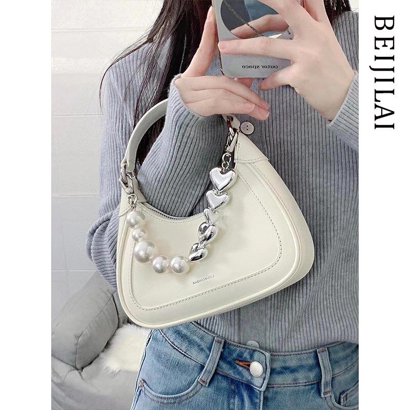 白色法式手提小包包女式2024新款精致高级感轻奢小众秋季斜挎小包