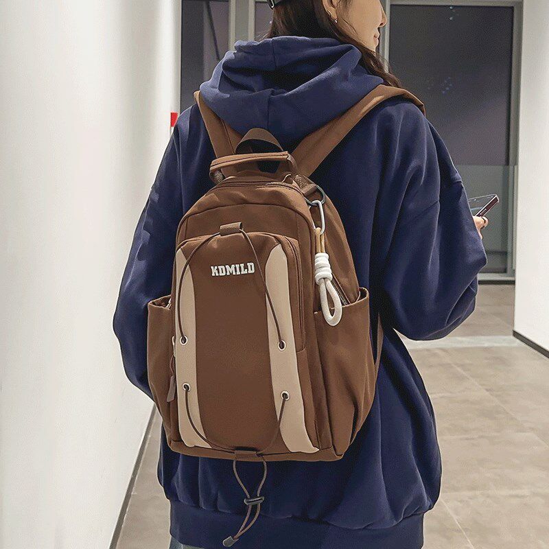 大容量书包暗黑系工装风学生双肩包男女街拍复古休闲高中旅行背包