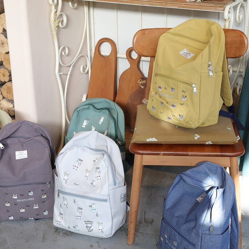 日系小众设计正品后揹包猫咪刺绣旅行揹包电脑包大容量多口袋布艺
