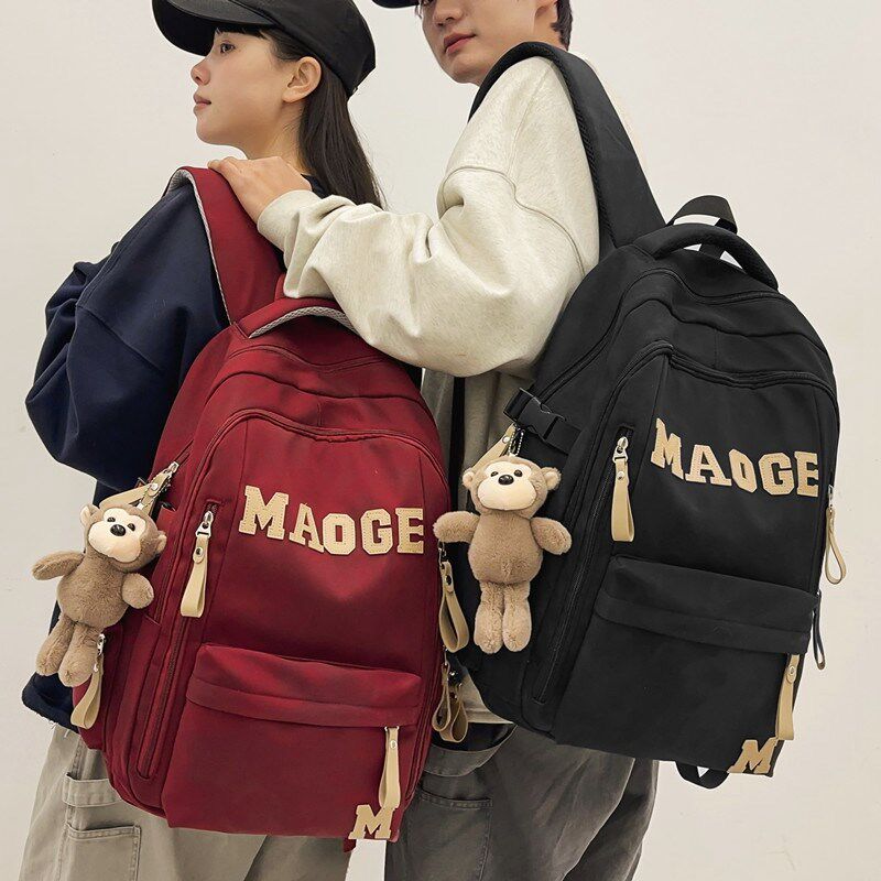 书包女初中生男高中学生潮酷大容量黑色双肩包大学生减负旅行背包