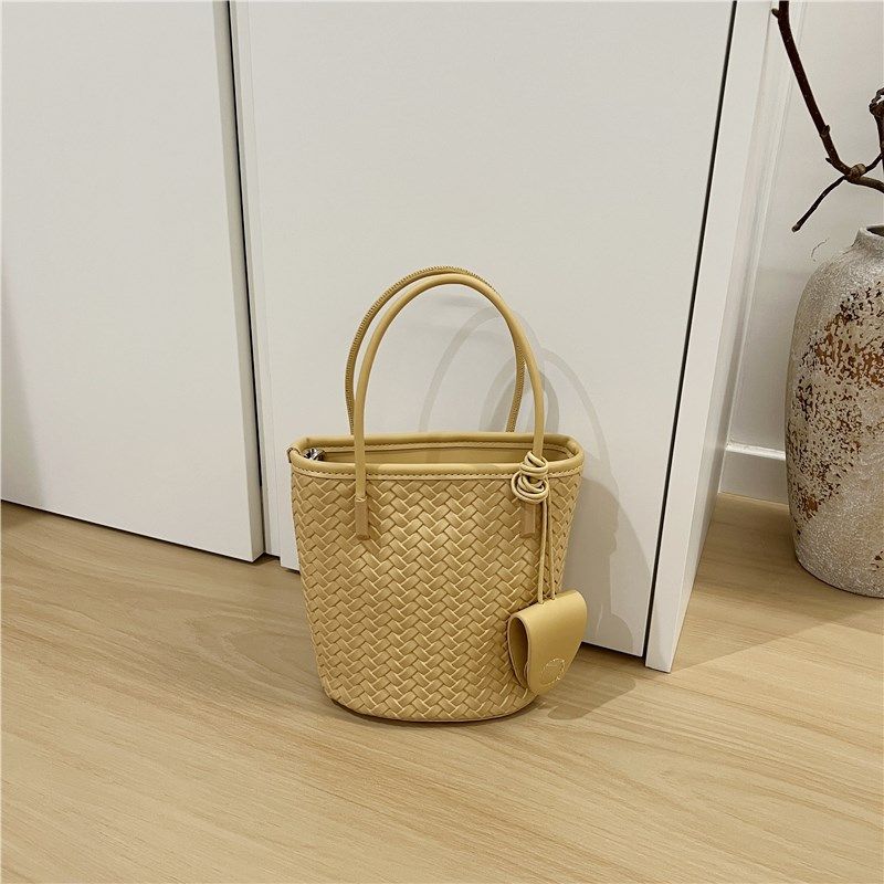 小脏柜 2025新款时尚编织手提小巧水桶包高级质感V单肩斜挎女包包