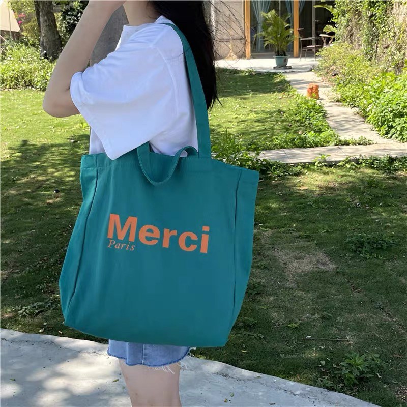 春夏限定一包两用Merci字母印花帆布包手提大容量柔软单肩包