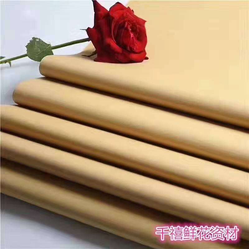 厂家 纯色牛皮纸包花复古英文报纸包书礼品原色鲜花立体包装纸